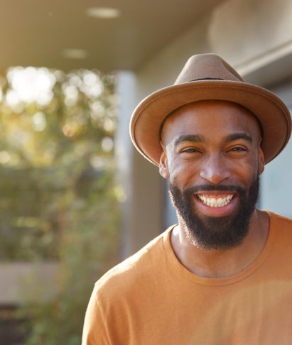portrait-of-smiling-african-american-man-wearing-h-2024-10-21-14-59-55-utc.jpg
